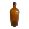 Old pharmacy bottle or herbalism in orange glass