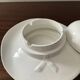 Vintage enameled porcelain hat pocket emptier