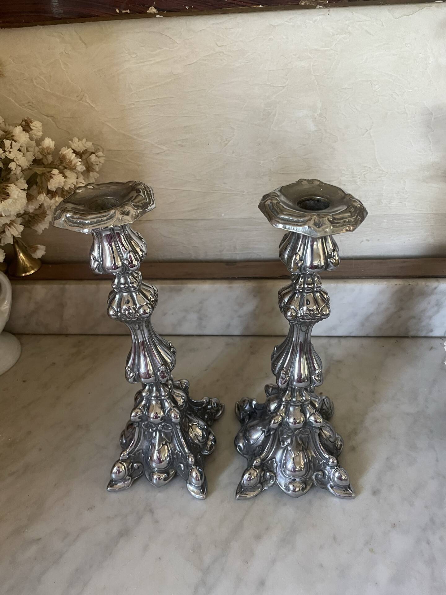 Pair of rococo silver-plated candlesticks