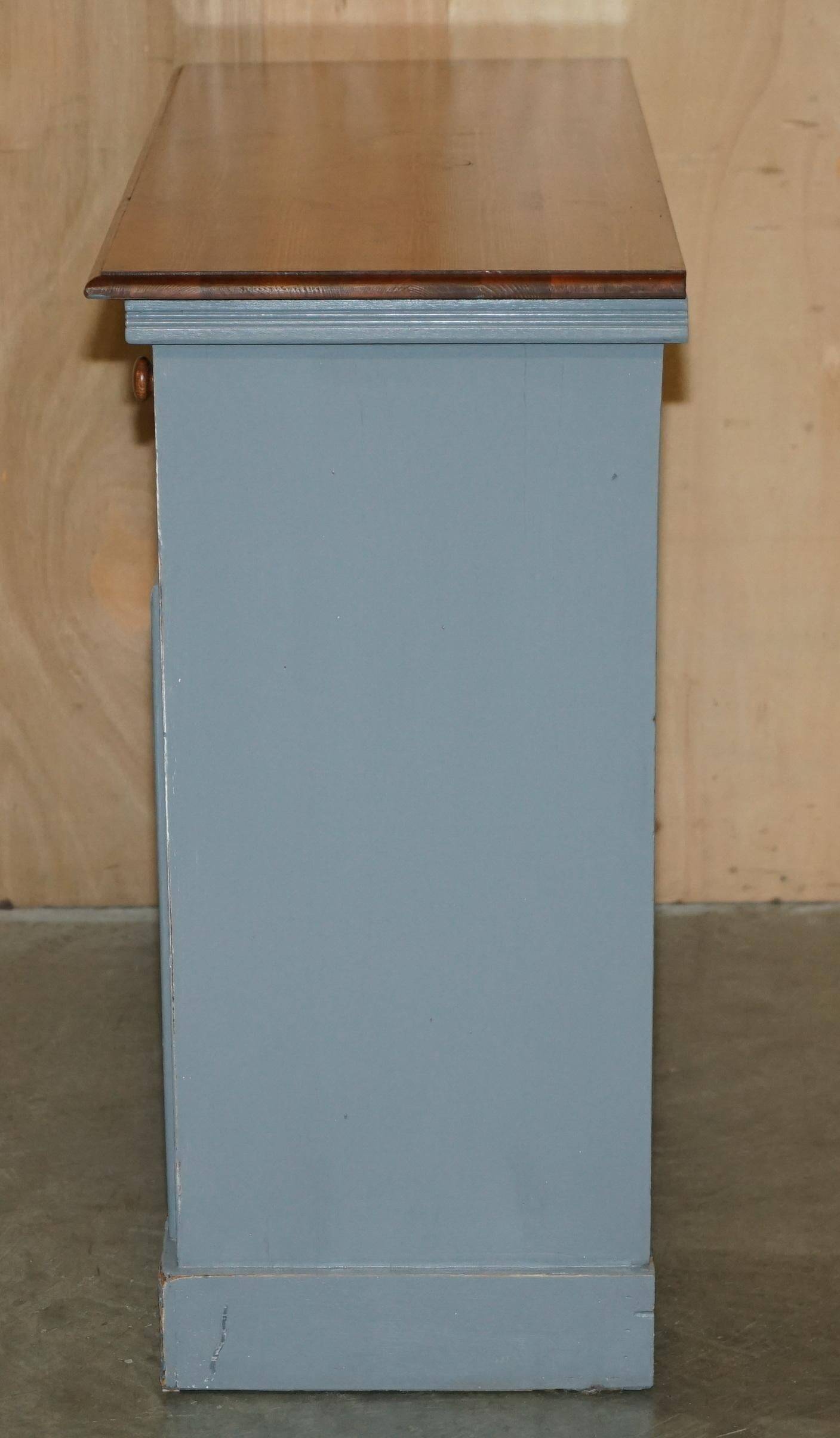 Vintage wooden furniture for 45 wine bottles with a drawer.