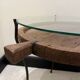 decorative wrought iron round table, glass and wood top.