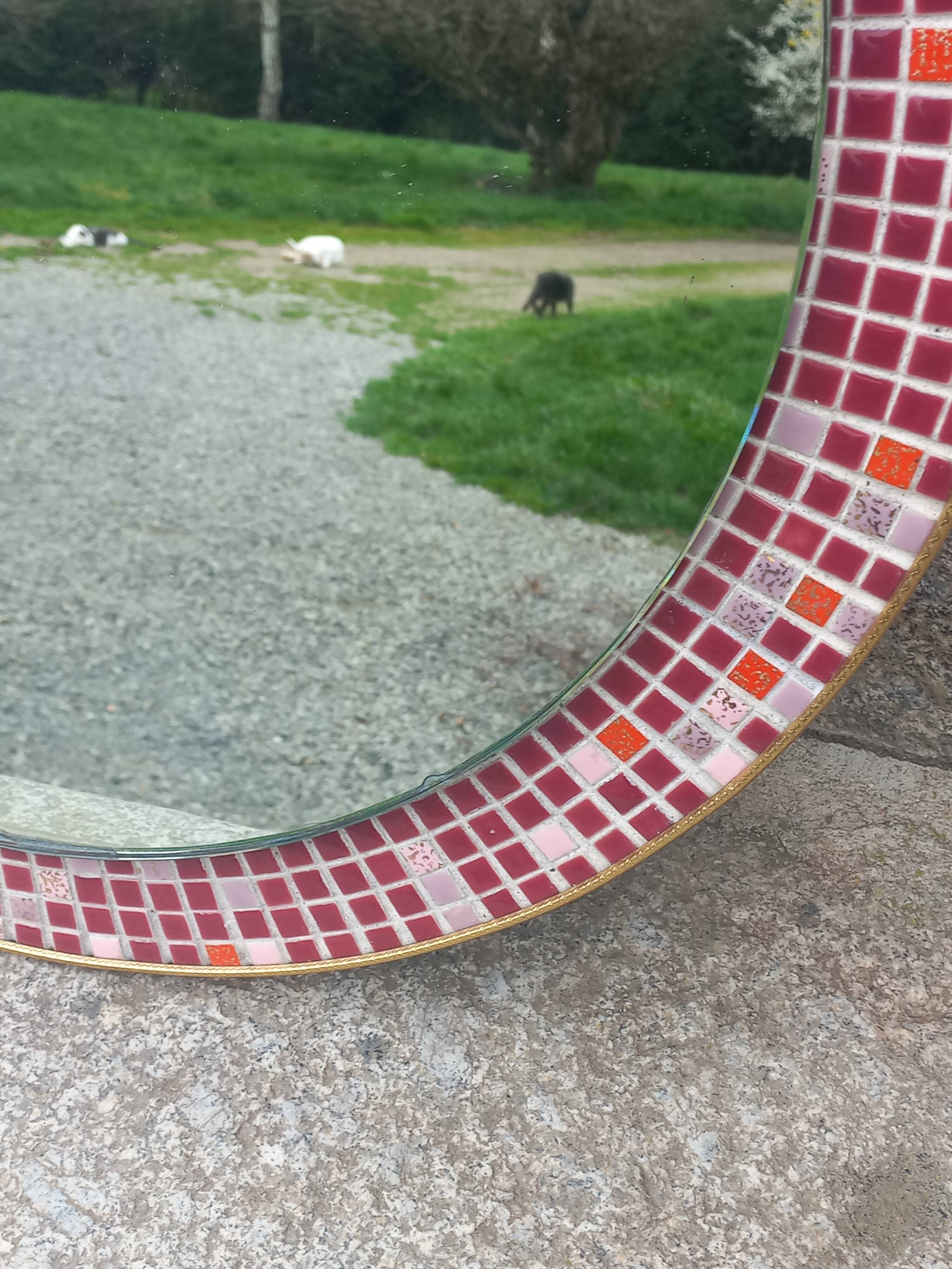 Vintage ceramic mirror from the 1960s.