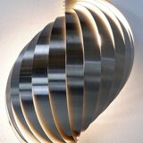 Swelling aluminum sconce by Henri Mathieu - 1970s