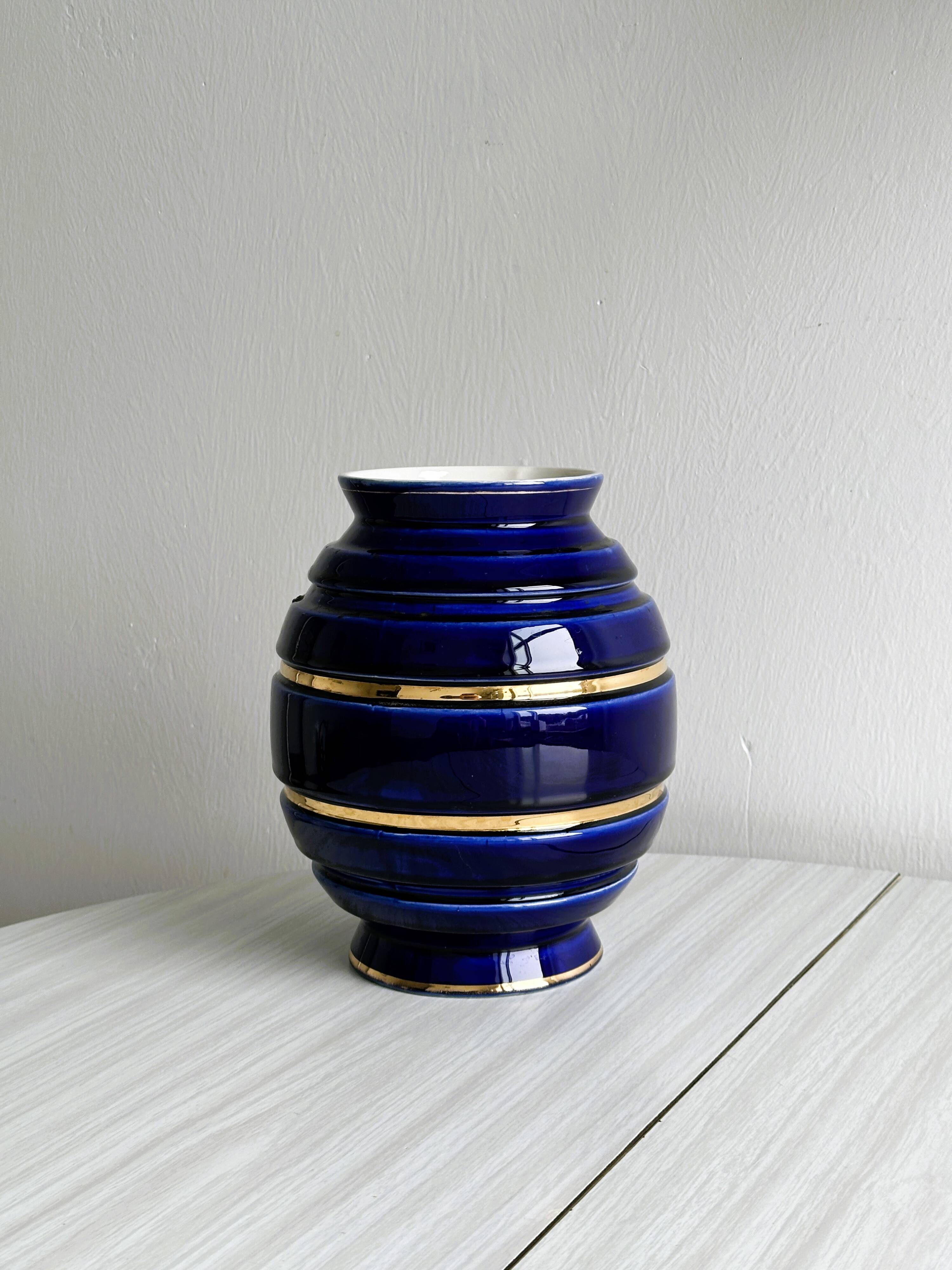 Vintage vase in shiny cobalt blue ceramic, gold edging