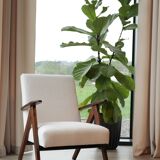 Fauteuil en tissu bouclette blanc et bois, milieu XXème