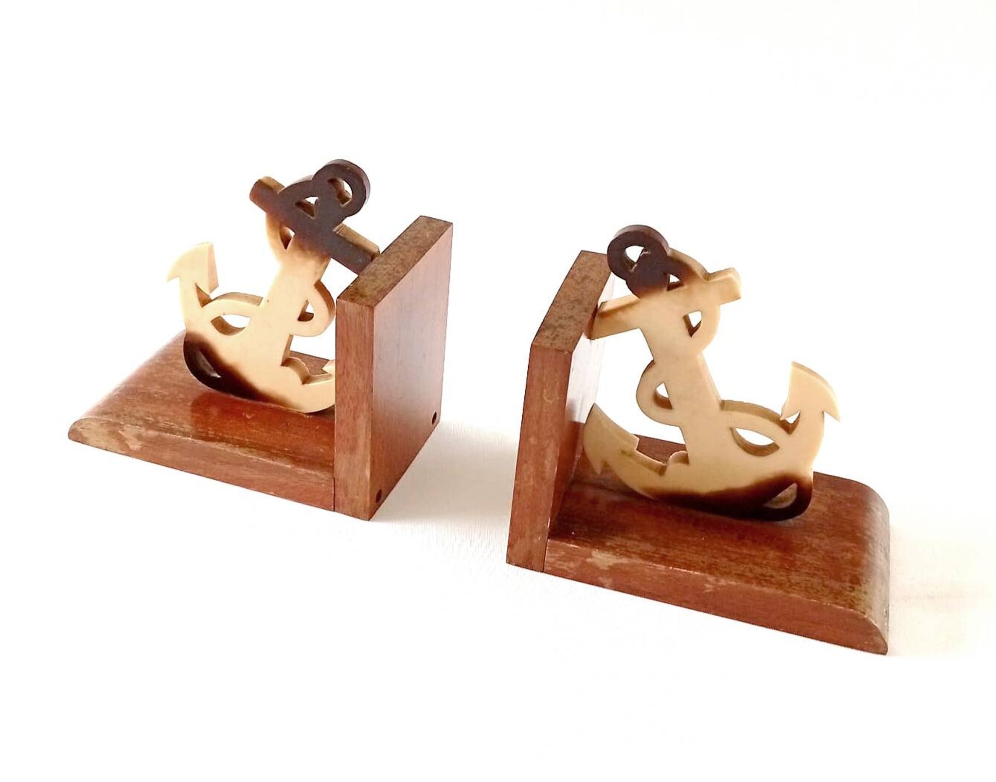 Wood and Bakelite bookends with marine anchors