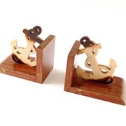 Wood and Bakelite bookends with marine anchors