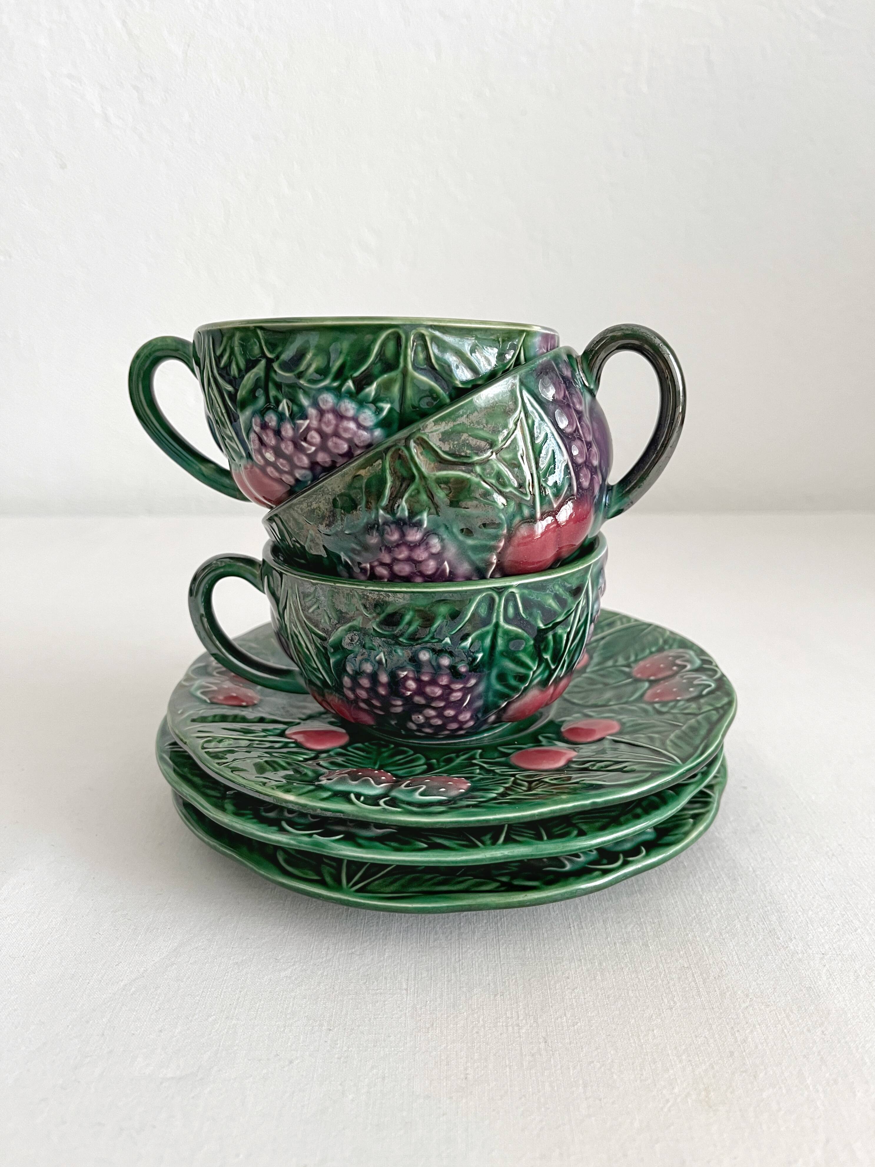 3 earthenware cups and saucers in barbotine fruit decor Salins vintage