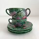 3 earthenware cups and saucers in barbotine fruit decor Salins vintage
