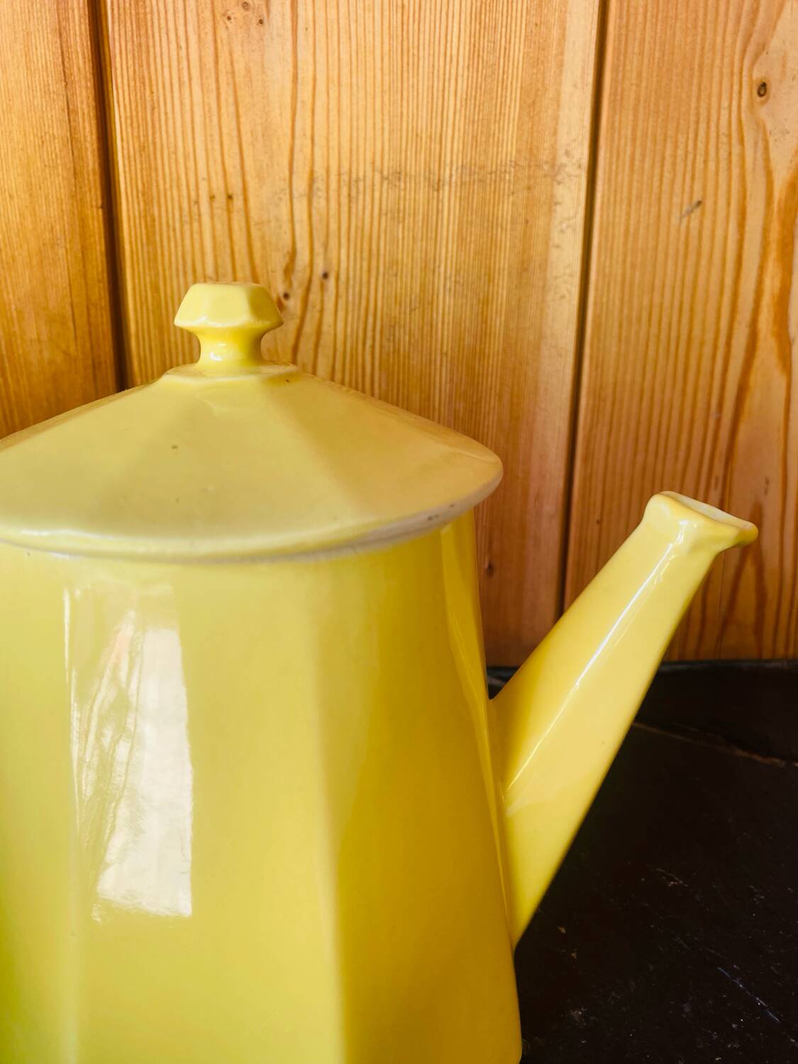 Vintage yellow ceramic teapot and milk jug.