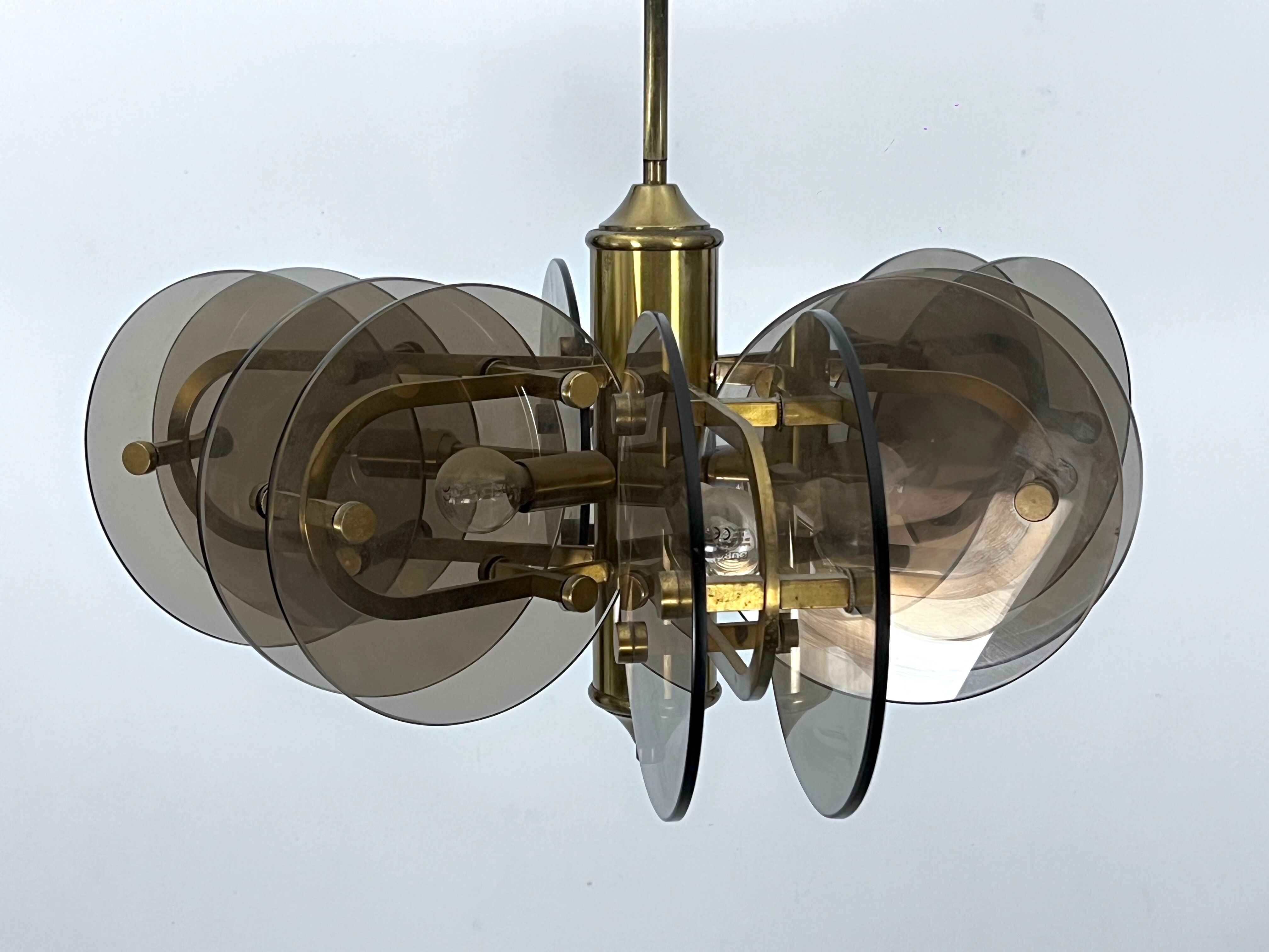 Postmodern brass and thick glass chandelier by Gino Paroldo. Italy 1970s