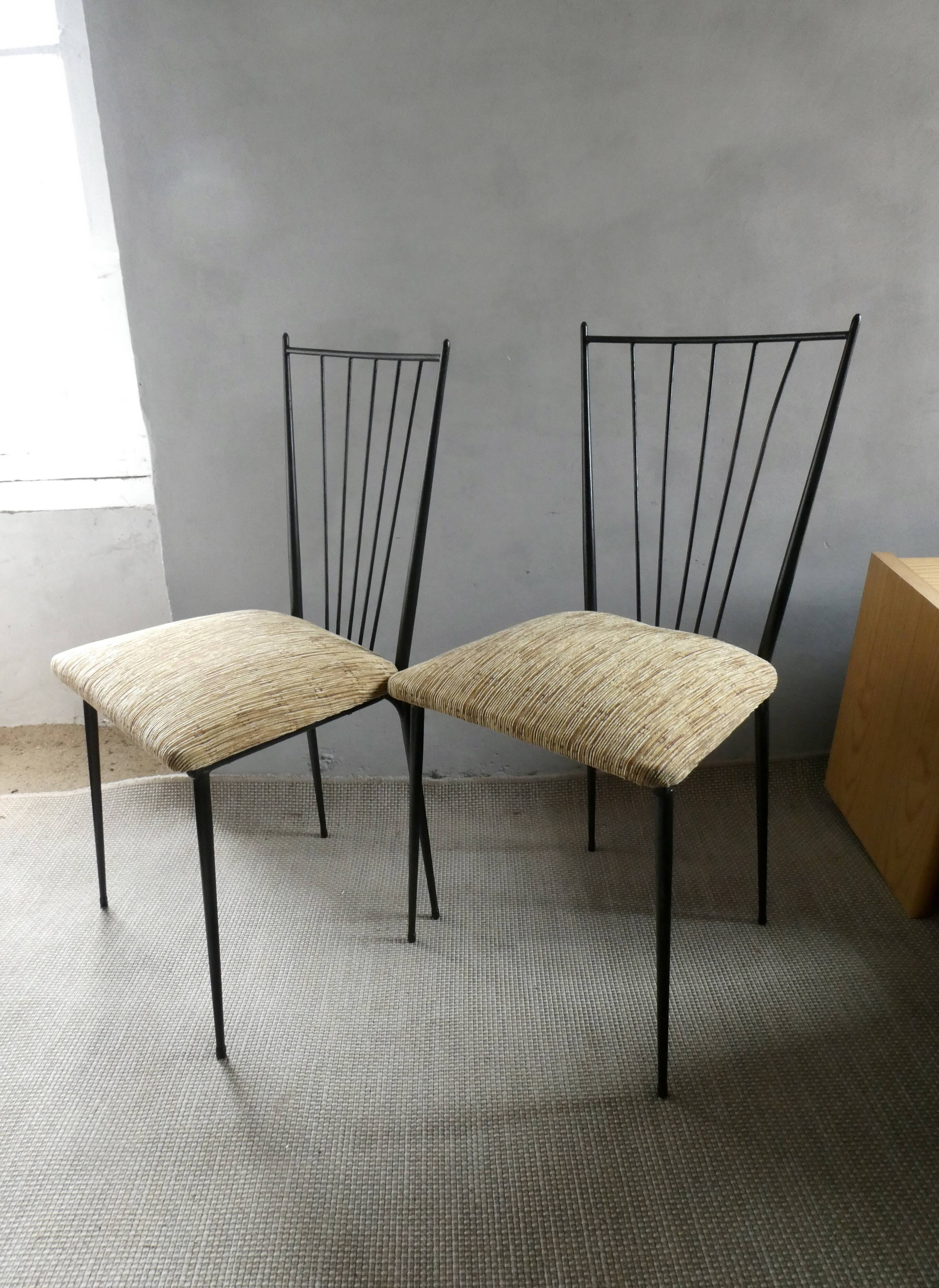 Pair of Colette Gueden chairs, black metal and fabric.