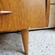 Commode pieds compas