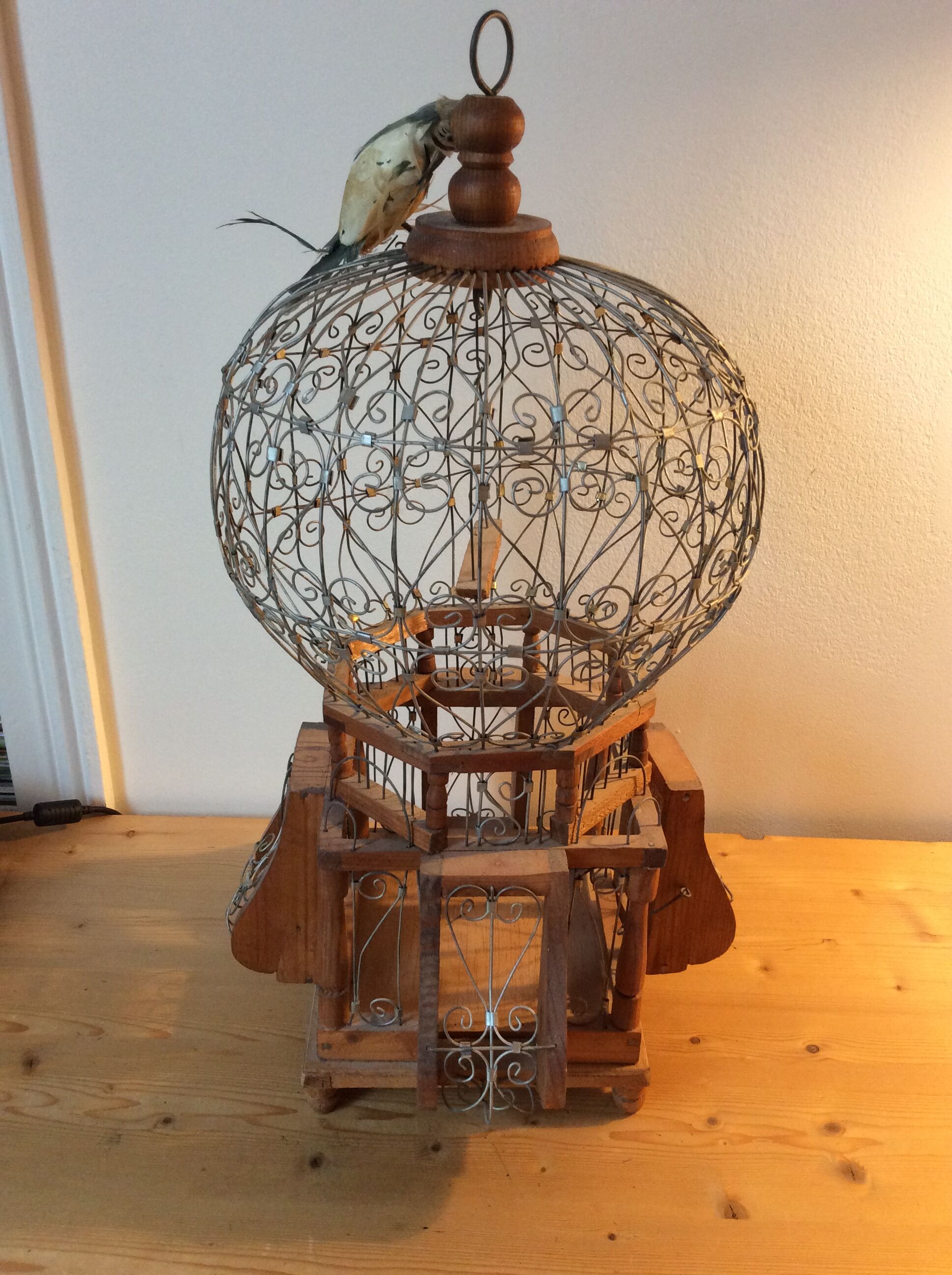 Pretty old bird cage.