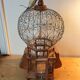 Pretty old bird cage.