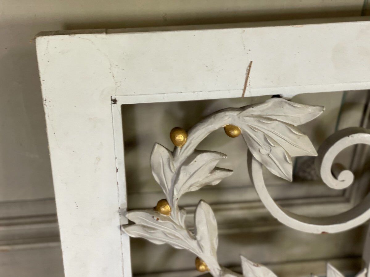 Pair of cast iron window shutters in Louis XVI style.