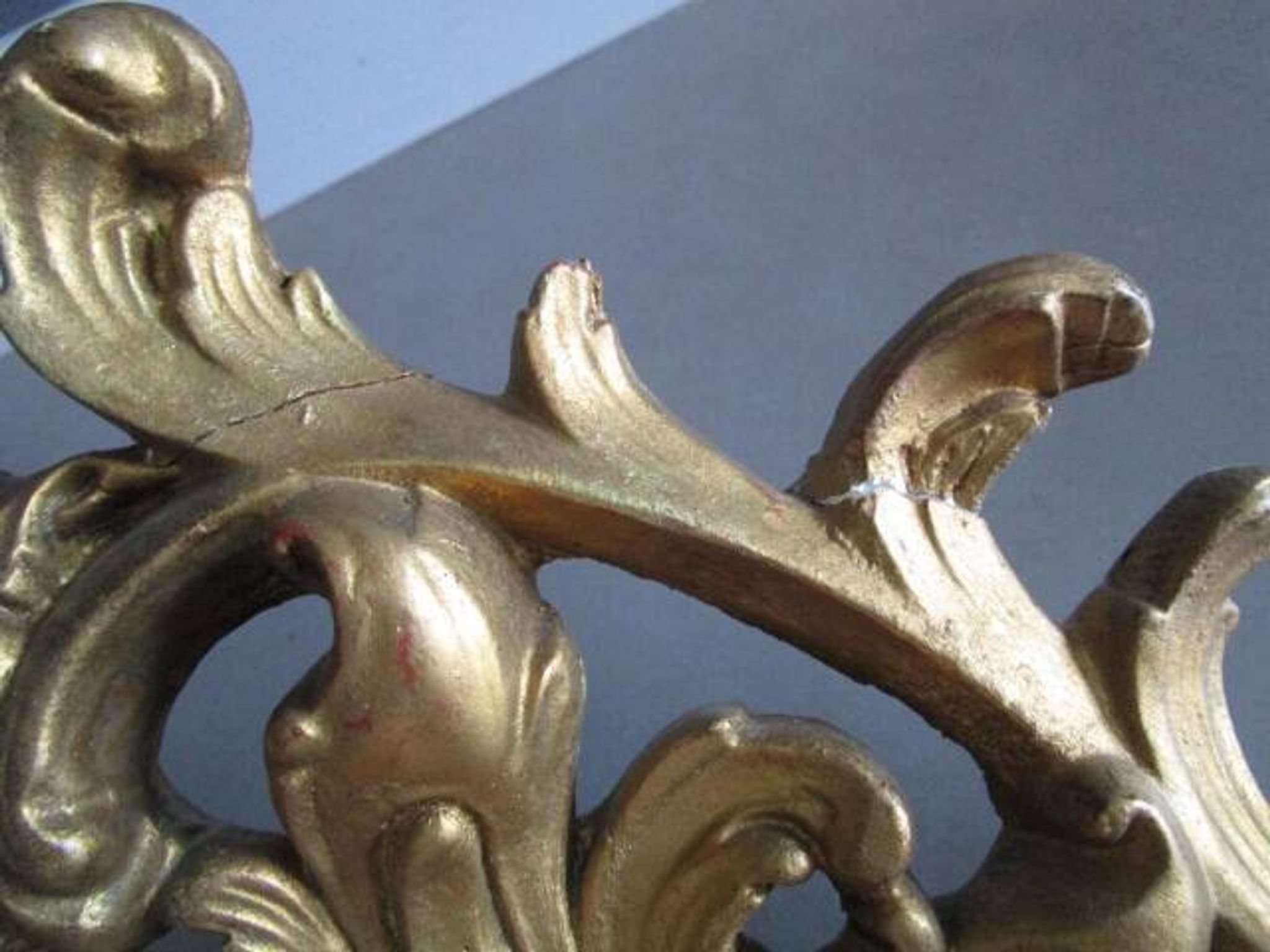 Antique mirror in wood and gilded stucco