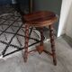 Tripod stool with turned legs
