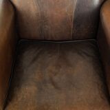 Armchair / lounge chair made of sheepskin leather with characterful patina