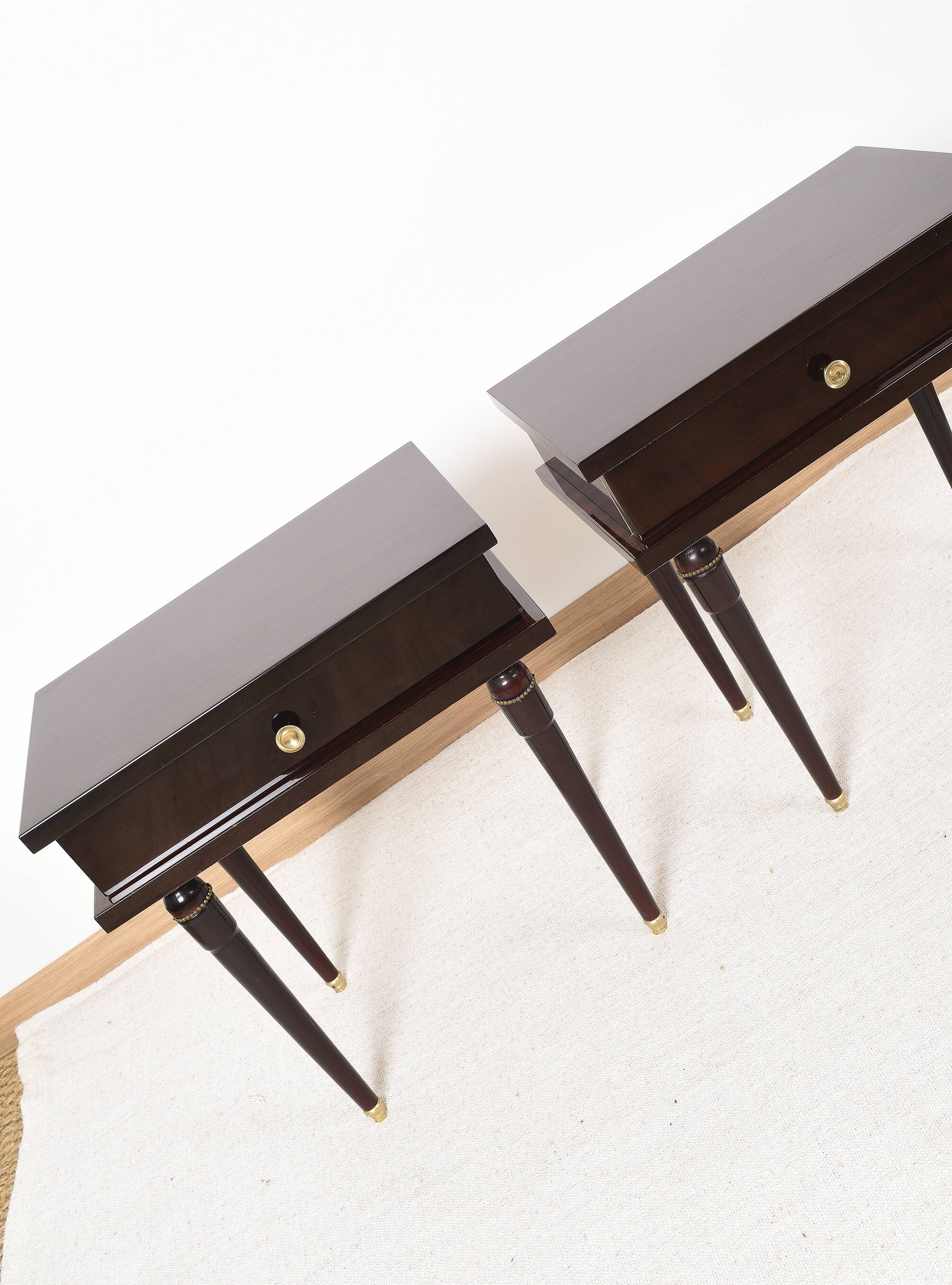 Pair of rosewood bedside tables, with drawer.