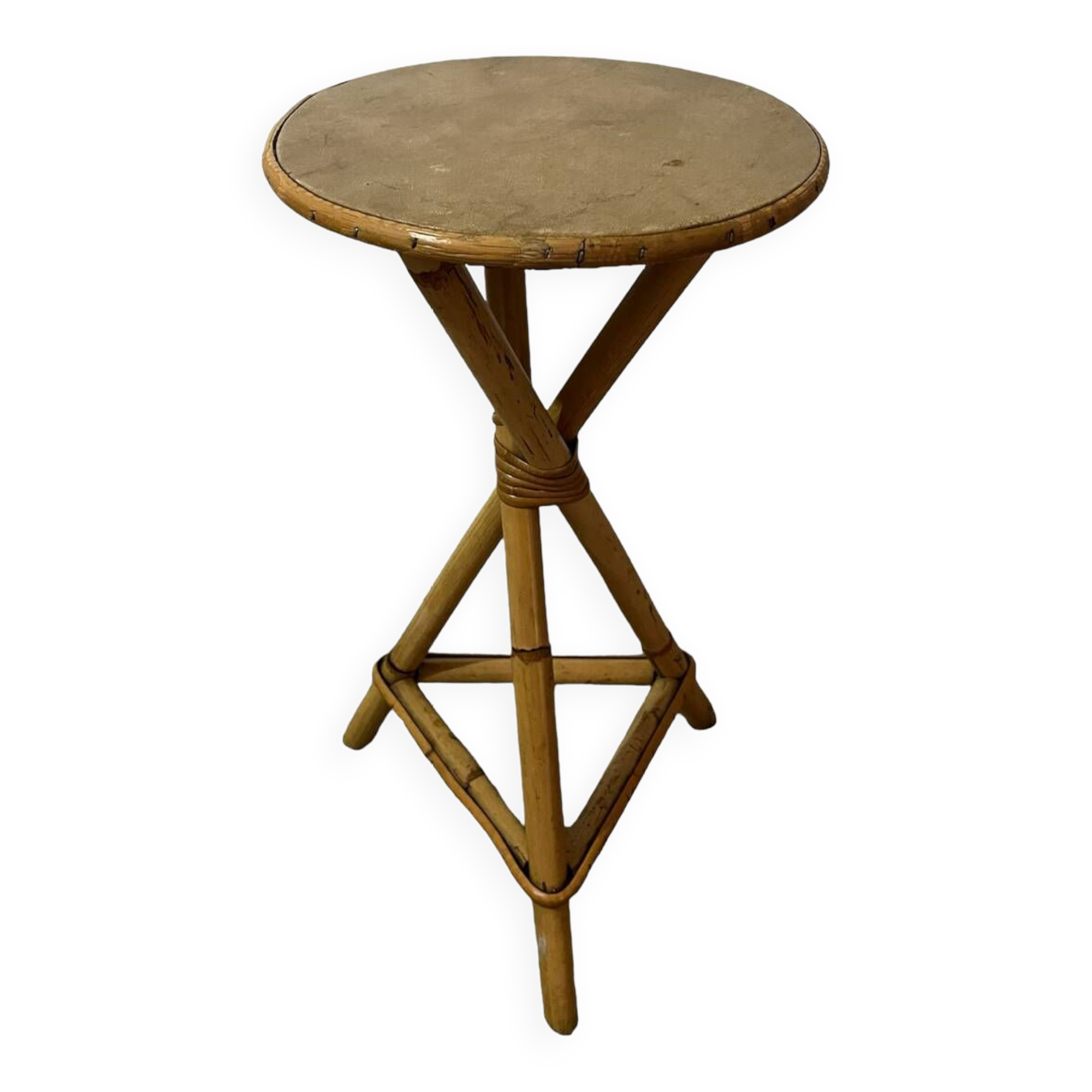 Plant holder or side table at the end of a bamboo sofa