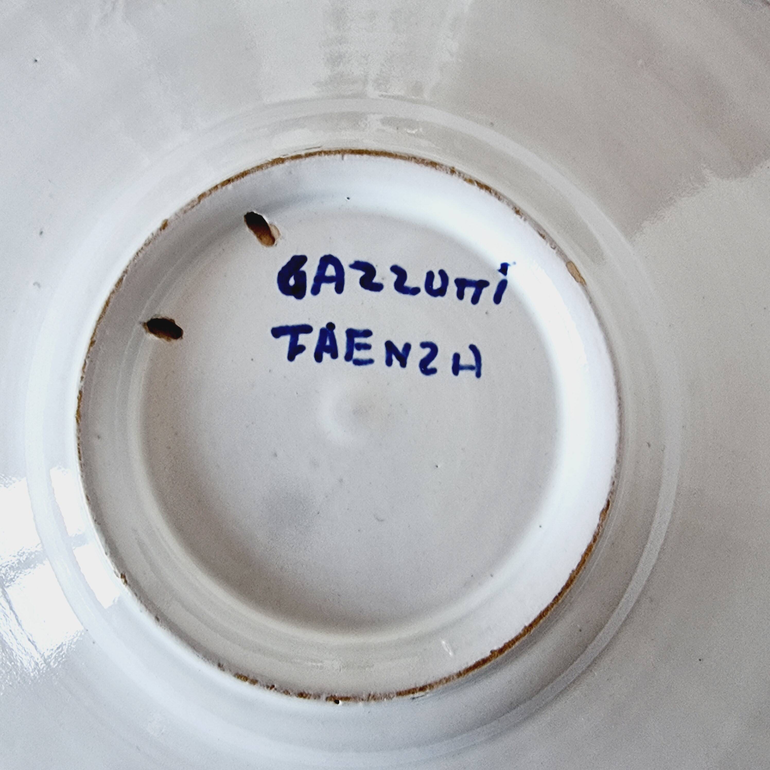 Antique Faenza soup plate made and hand painted in Italy and signed 1950s, p