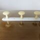 Wall coat rack with 3 coat hooks in bakelite from the 50s and 60s