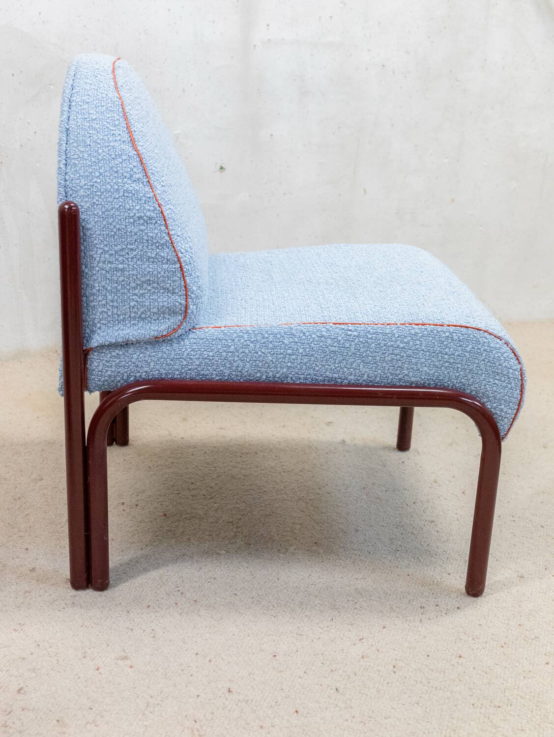 Souvignet armchair reupholstered in sky blue boucle.