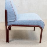 Souvignet armchair reupholstered in sky blue boucle.