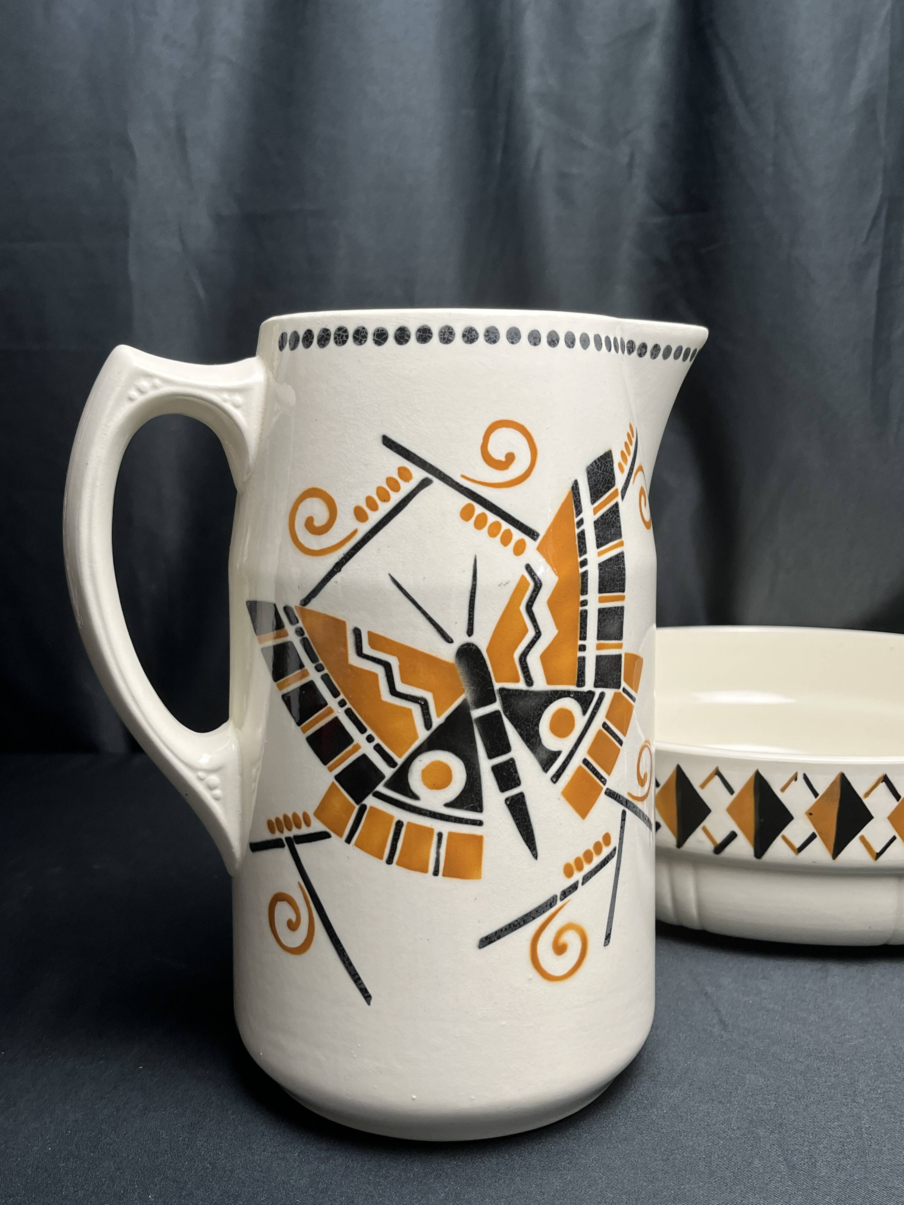 Art Deco, brocade jug and ceramic basin by Badonwiller around 1930.
