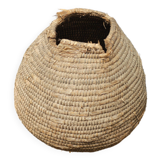 Old basket, burgundy straw and bramble, woven basket, interior decoration, pantry, flowerpot