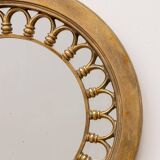 Round golden mirror