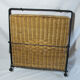 Vintage magazine rack in metal and wicker