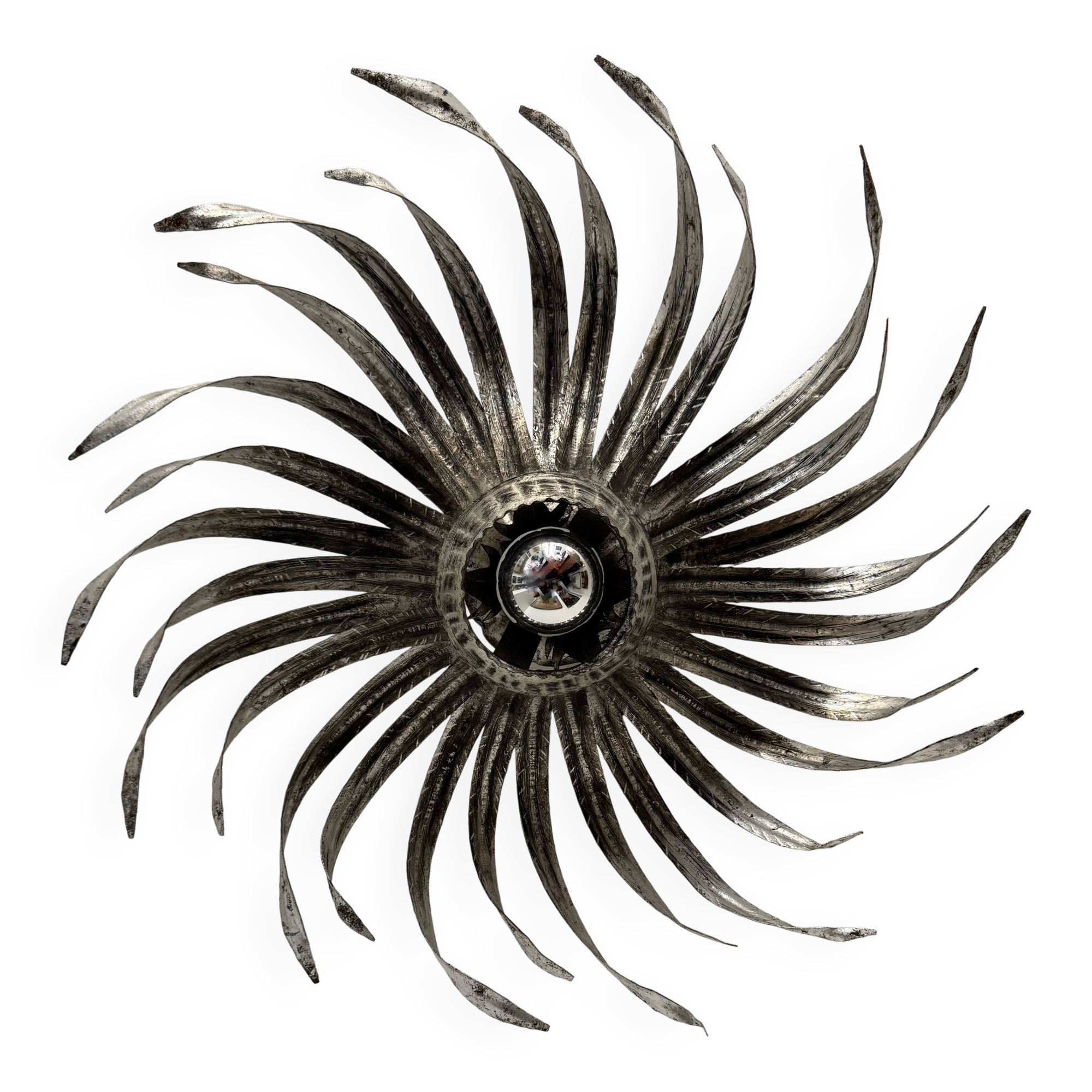 Silver wrought iron sunburst wall light from the 1960s.