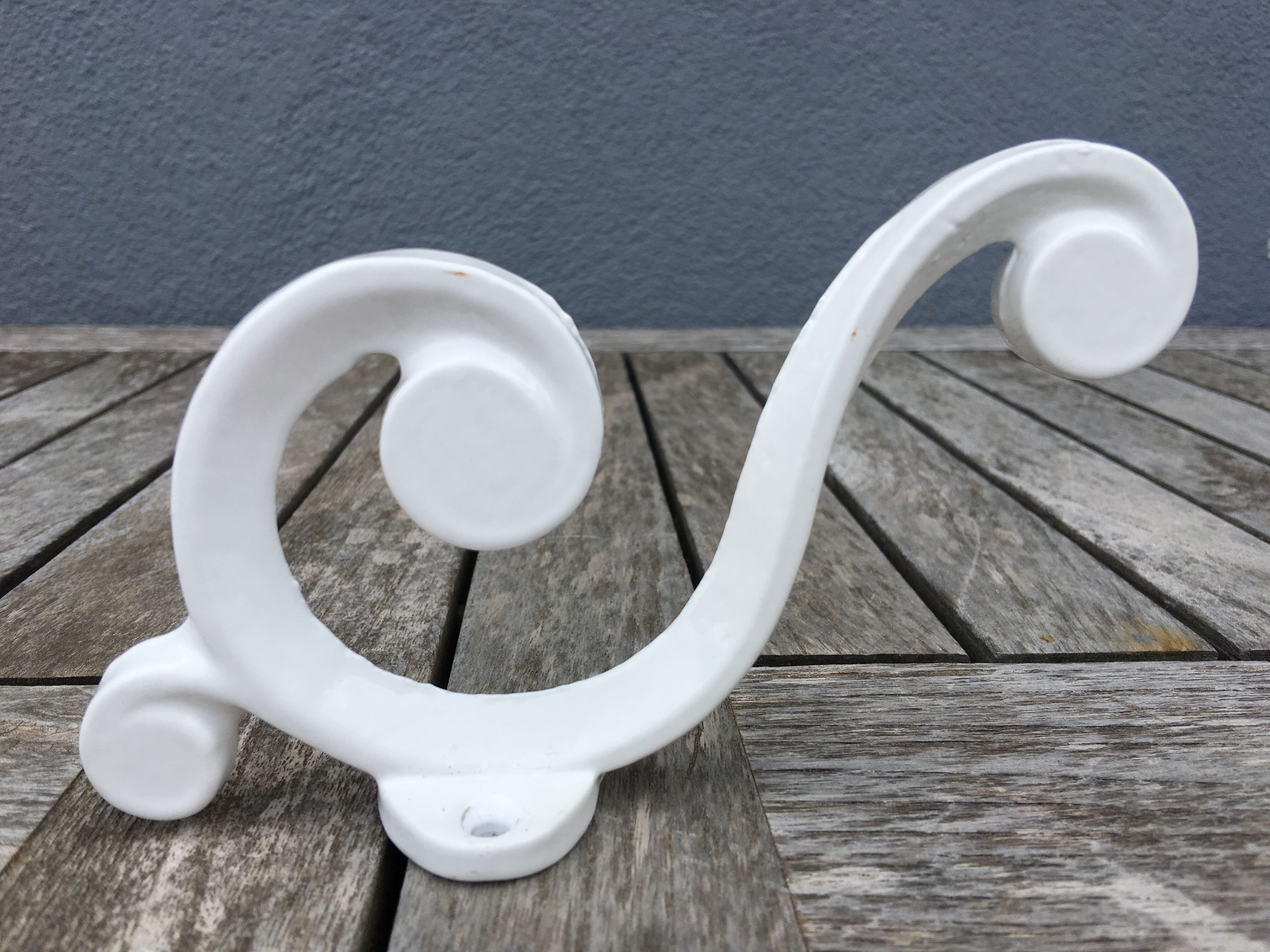 Enamelled cast iron hanger, circa 1950