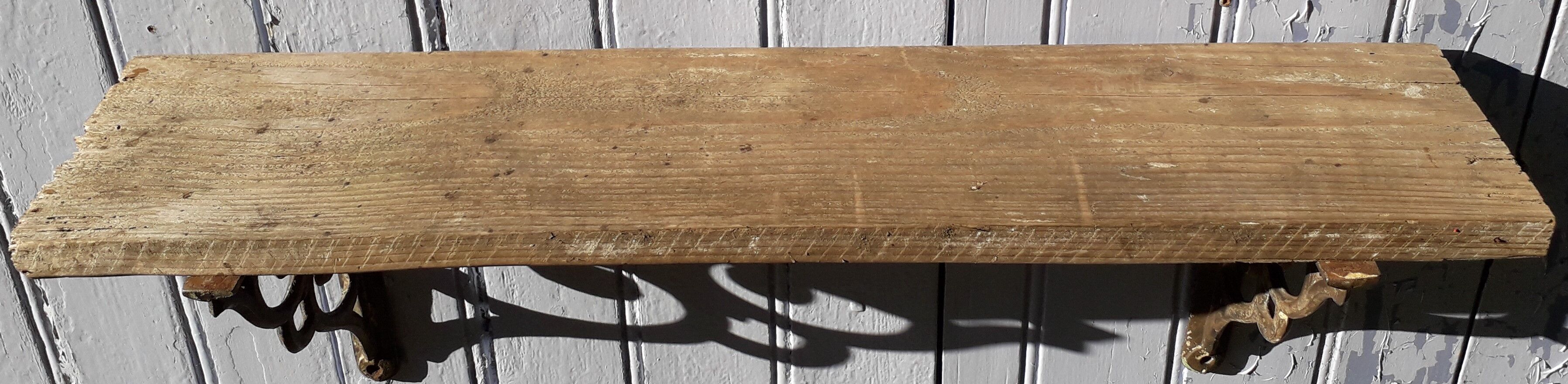 Wooden shelf and cast iron