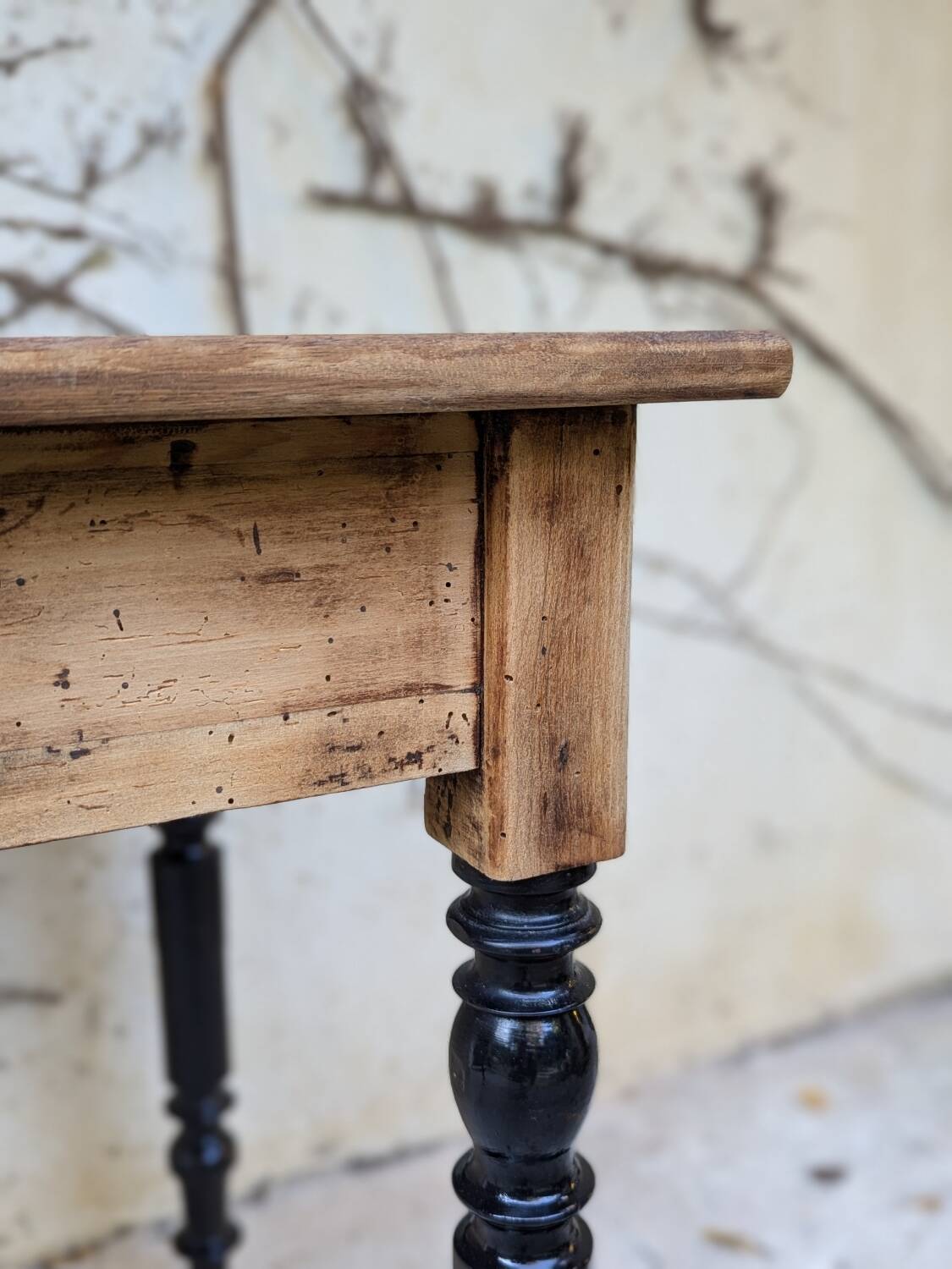 Solid wood desk, black base