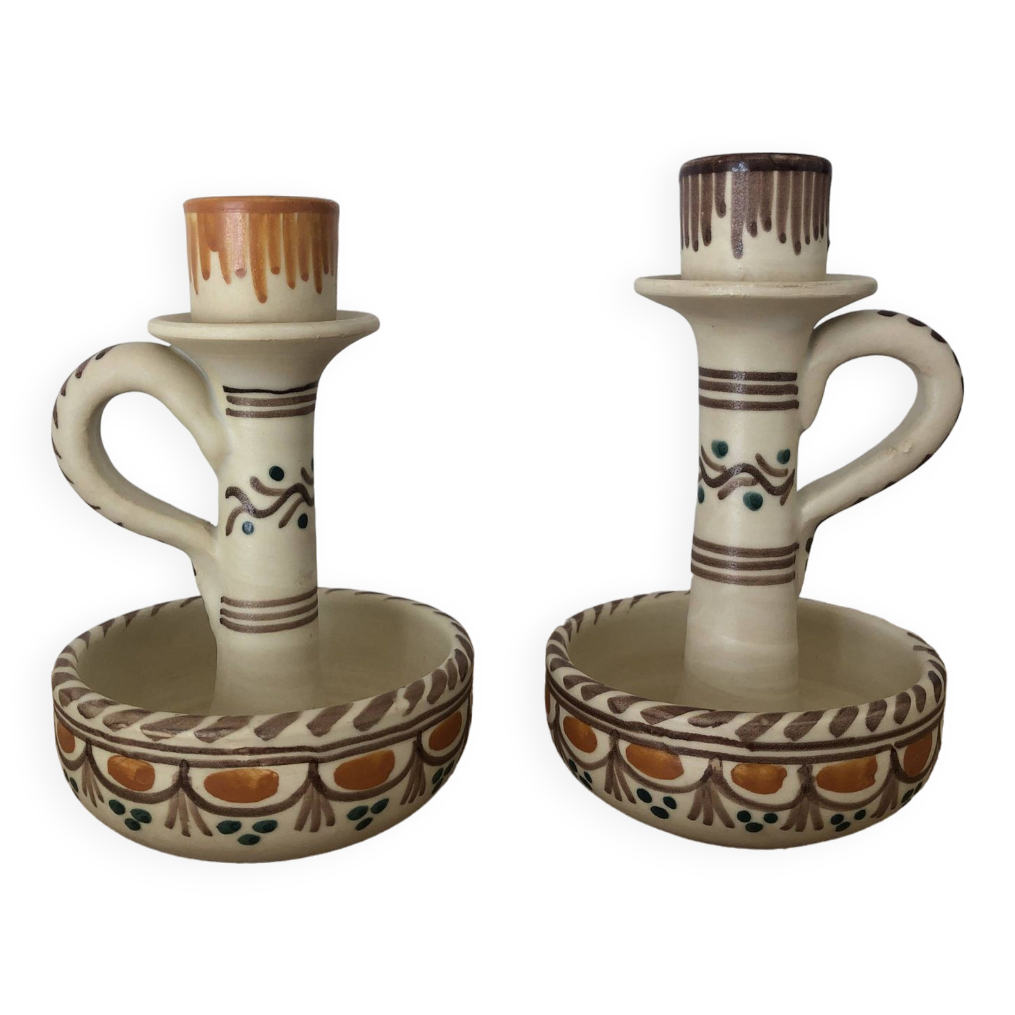 Set of two candlesticks/candle holders in orange and brown tones
