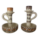 Set of two candlesticks/candle holders in orange and brown tones