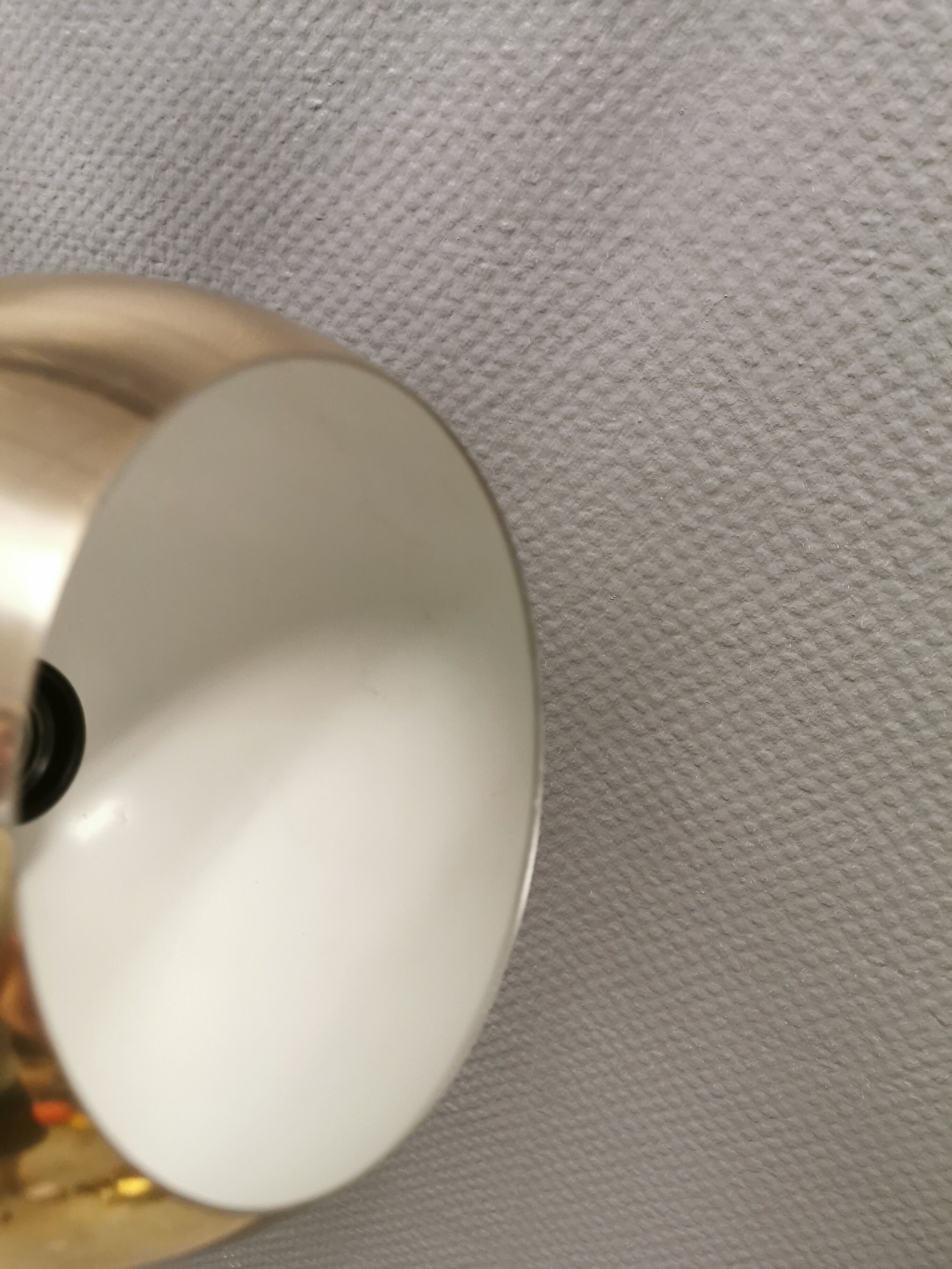 Danish ball lamp from the 80s, in gold colored lacquer.