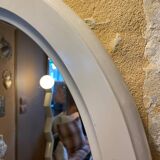 Oval mirror in white wood