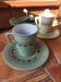 A pair of vintage cups and saucers in glazed stoneware.