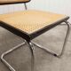 Fauteuil b64 Breuer noir cannage accoudoirs et tampons neufs