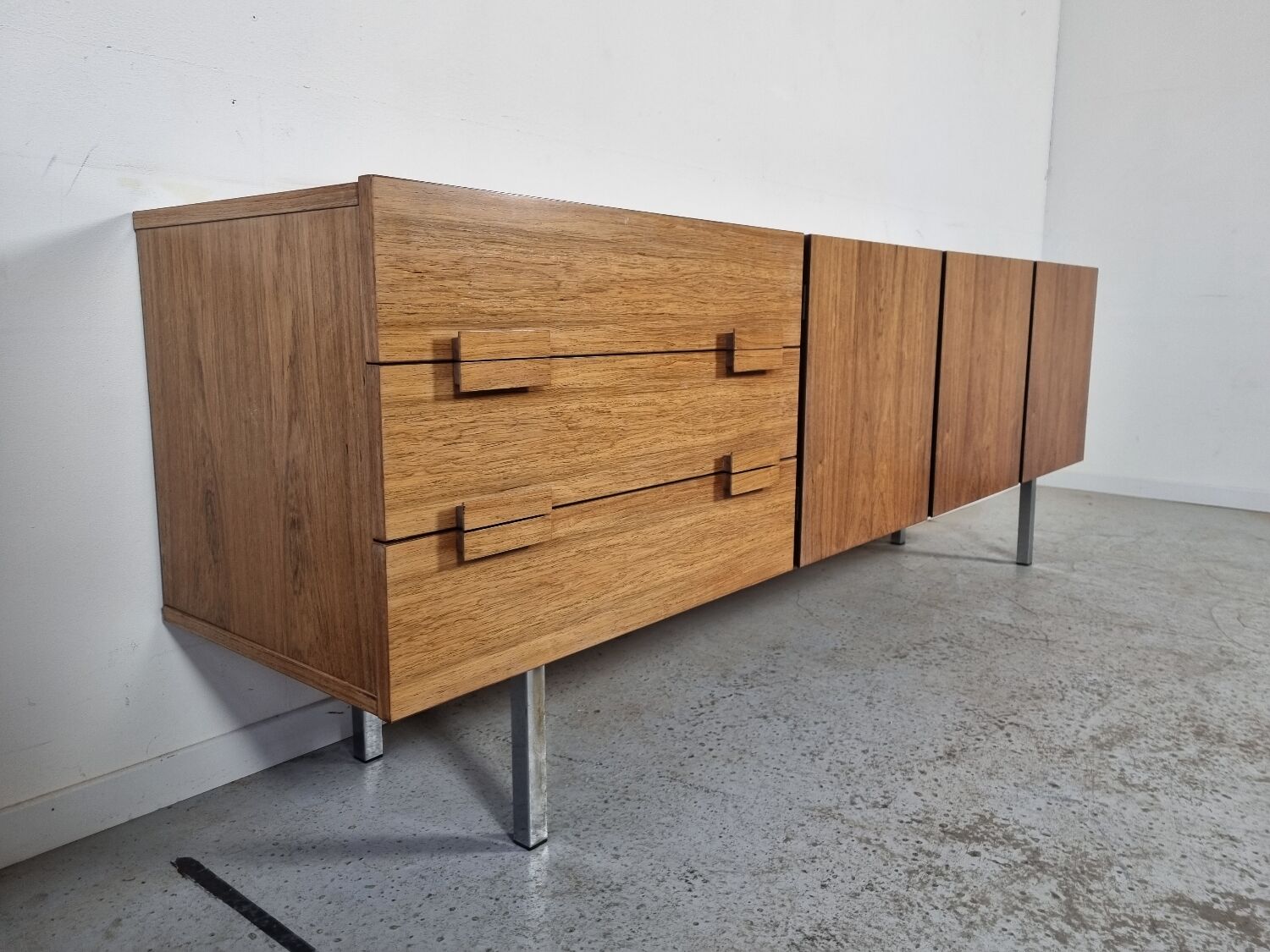 Scandinavian row in rosewood and chrome, 60s