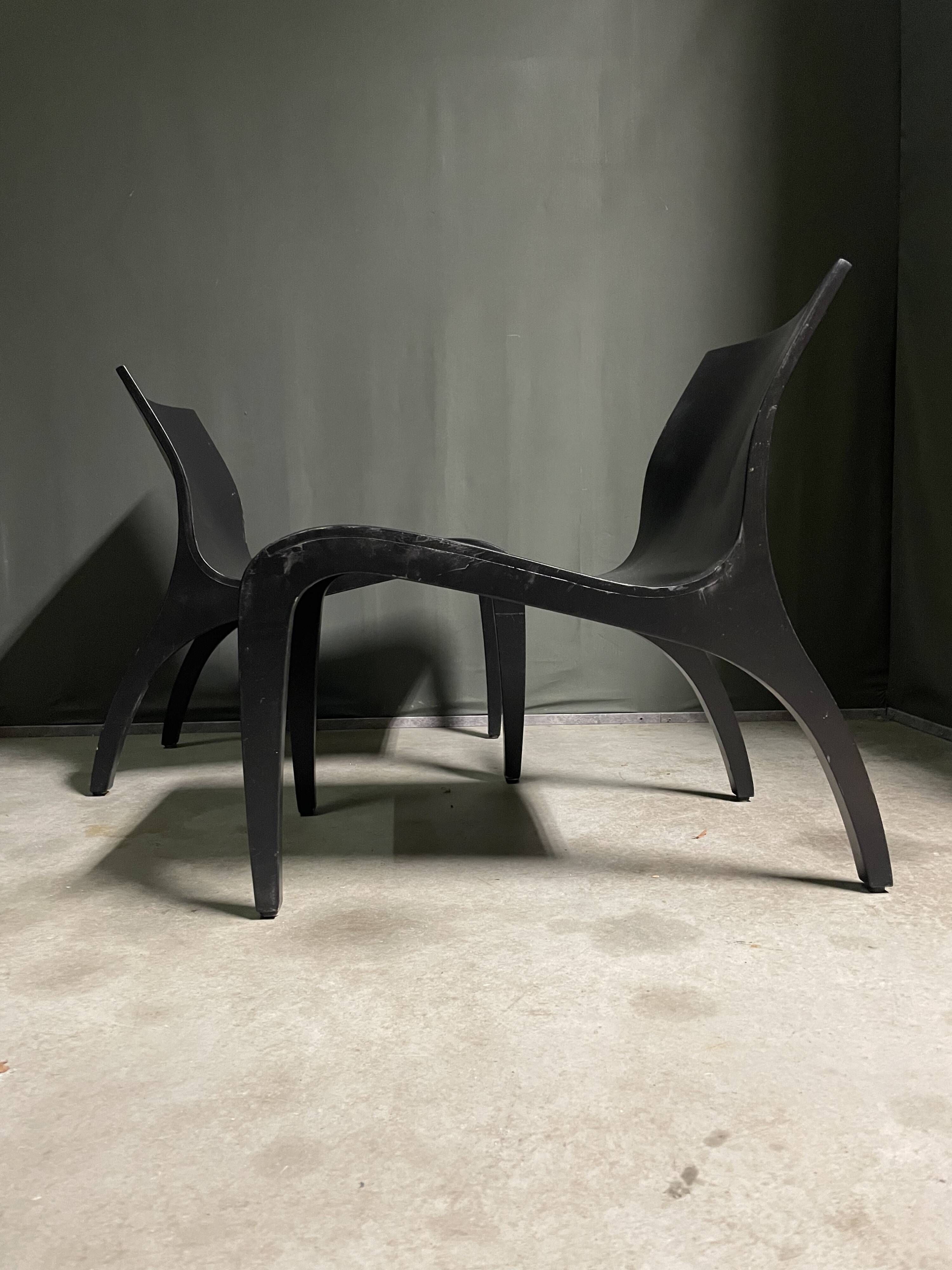 A pair Minimalist bent plywood lounge chairs