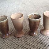Series of 4 sandstone cups