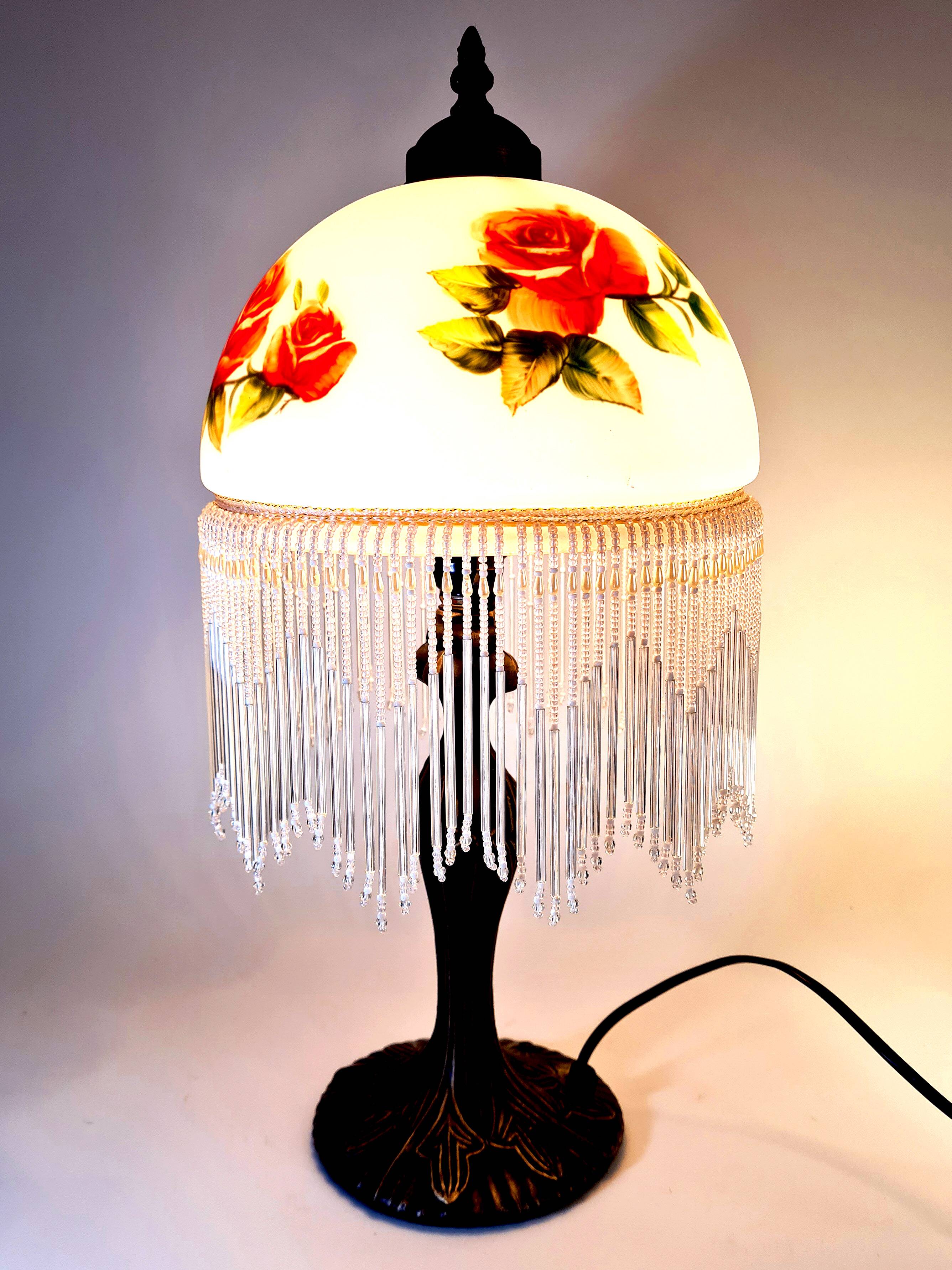Vintage Tiffany-style fringed lamp with floral globe