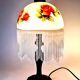 Vintage Tiffany-style fringed lamp with floral globe