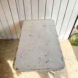 White folding metal bistro table