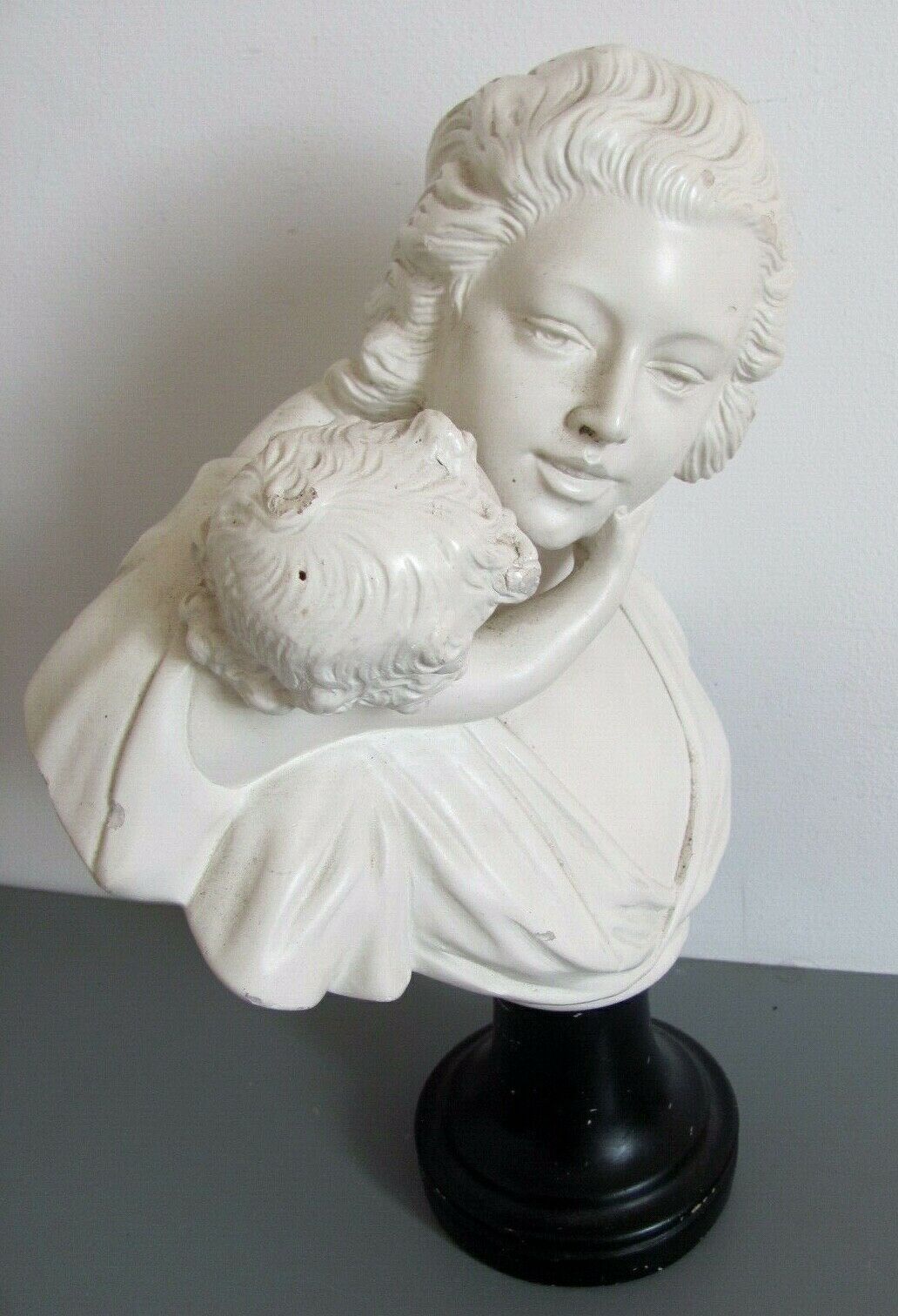 Sculpture in plaster, young mother and child